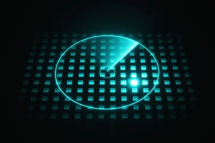 A cyan radar sweep scanning a grid of API nodes